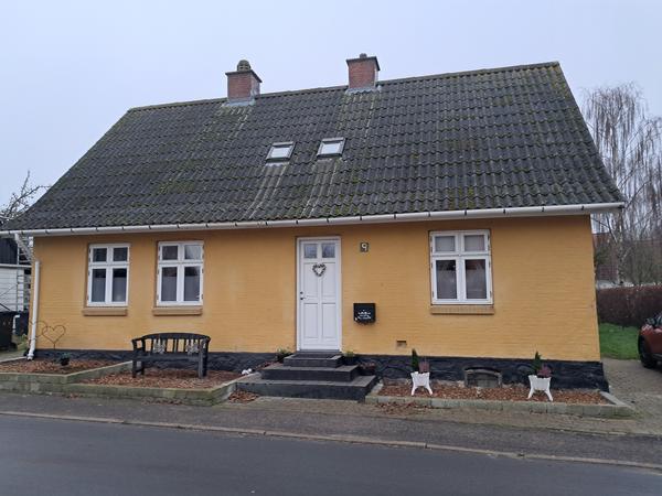 Montering af træbeklædning på hus