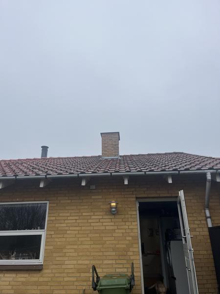 Nedrivning af skorsten og udbedring