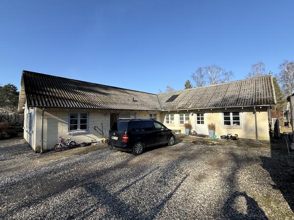 Rensning og maling af asbesttag