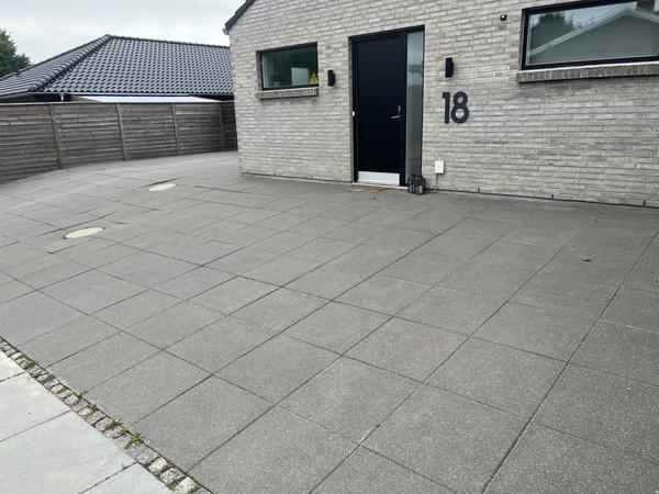 Udskiftning fra fliser til beplantning