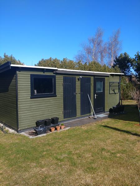 Udskiftning af tagpap og døre på udhus