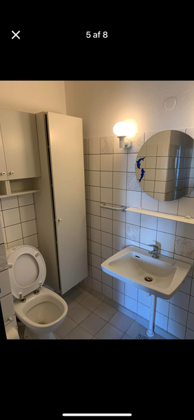 Flisearbejde og montering af bruseniche