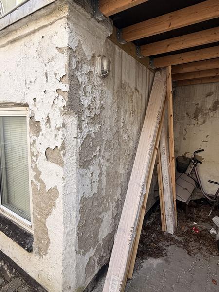 Oppudsning af bagfacade med netforstærkning