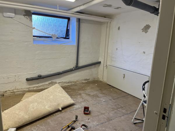 Strømpeforing og nye stigrør i ejendom