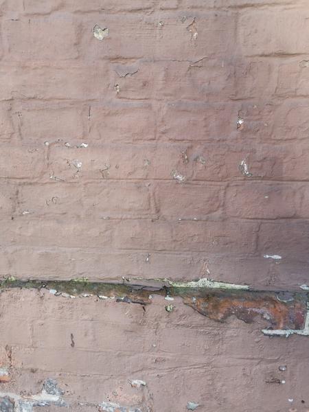 Pudsning og maling af facade i gårdhave