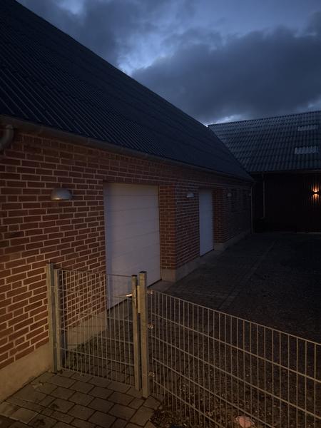 Hulmursisolering af staldbygning og stuehus