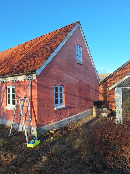 Fjernelse af rød maling fra mursten