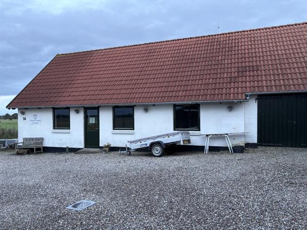 Hulmursisolering af ridestald