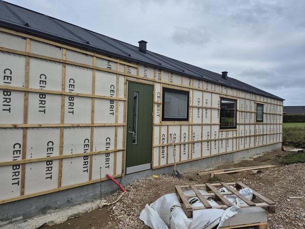 Udvendig træbeklædning af hus