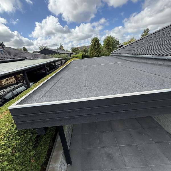Udvidelse af carport med isoleret skur/værksted