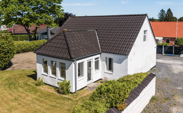 Facaderenovering af hus med sandblæsning