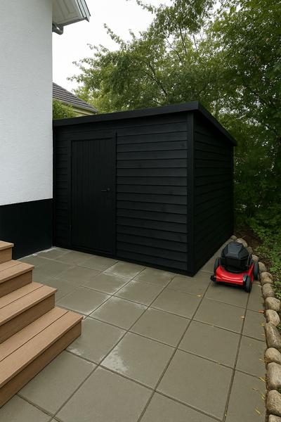Opførelse af carport og skur med hegn