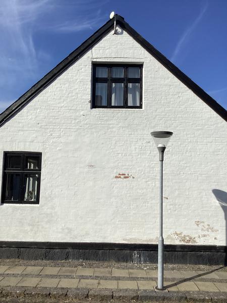 Pudsning af facade på hus