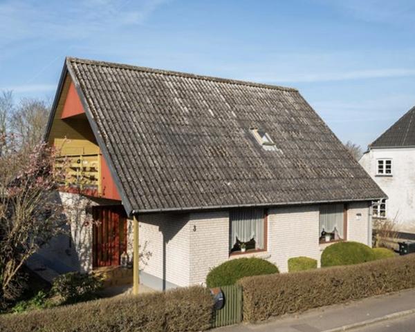 Rensning og maling af asbesttag