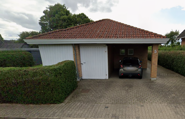 Indskrænkning af skur under carport