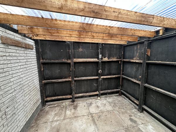 Udskiftning af træbeklædning og tag på garage